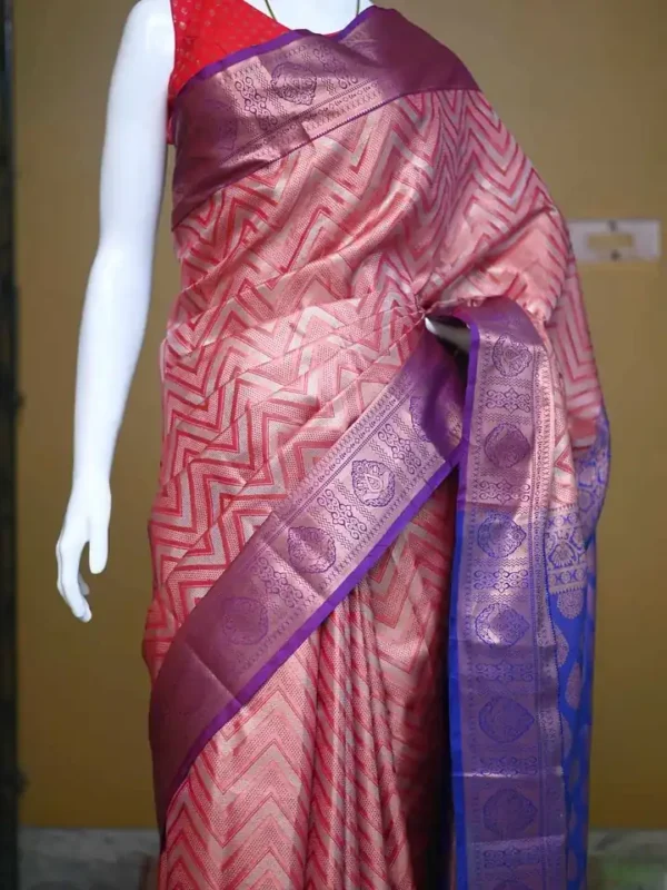 Rust color with blue border kanjivaram work on Pure silk saree