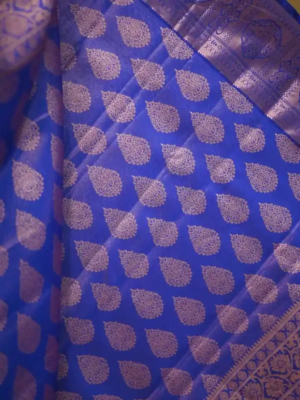 Rust color with blue border kanjivaram work on Pure silk saree