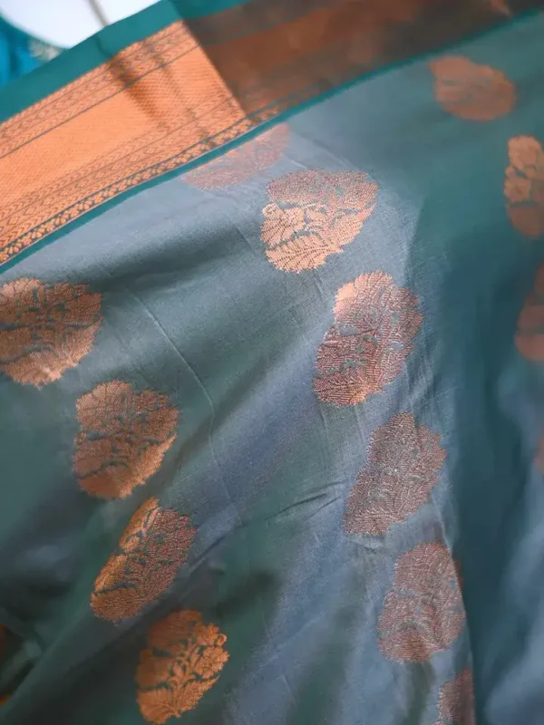 Green color with copper jari border kanjivaram work on Pure silk saree
