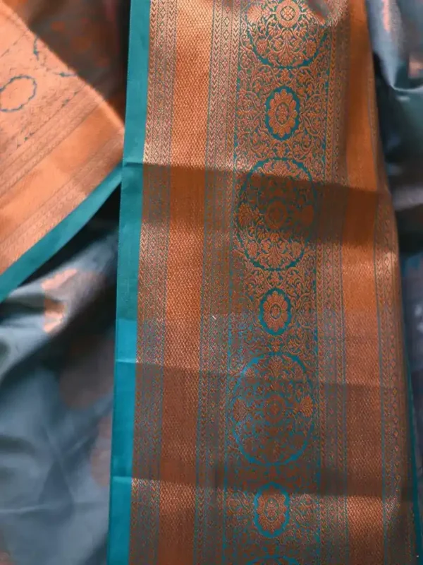 Green color with copper jari border kanjivaram work on Pure silk saree