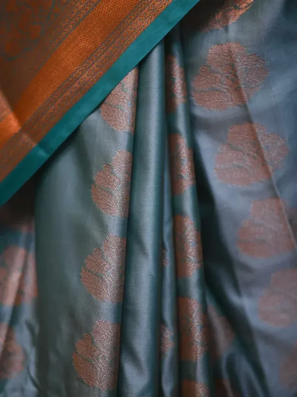 Green color with copper jari border kanjivaram work on Pure silk saree