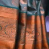Green color with copper jari border kanjivaram work on Pure silk saree