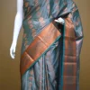 Green color with copper jari border kanjivaram work on Pure silk saree