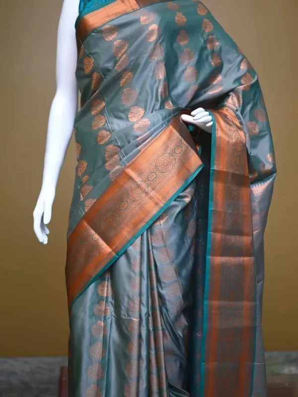 Green color with copper jari border kanjivaram work on Pure silk saree