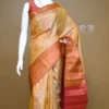 Biscuit color with Brown border kanjivaram work on Pure silk saree