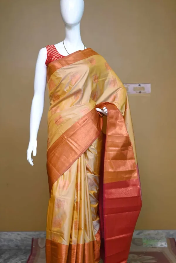 Biscuit color with Brown border kanjivaram work on Pure silk saree
