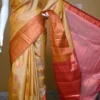 Biscuit color with Brown border kanjivaram work on Pure silk saree