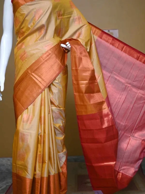 Biscuit color with Brown border kanjivaram work on Pure silk saree