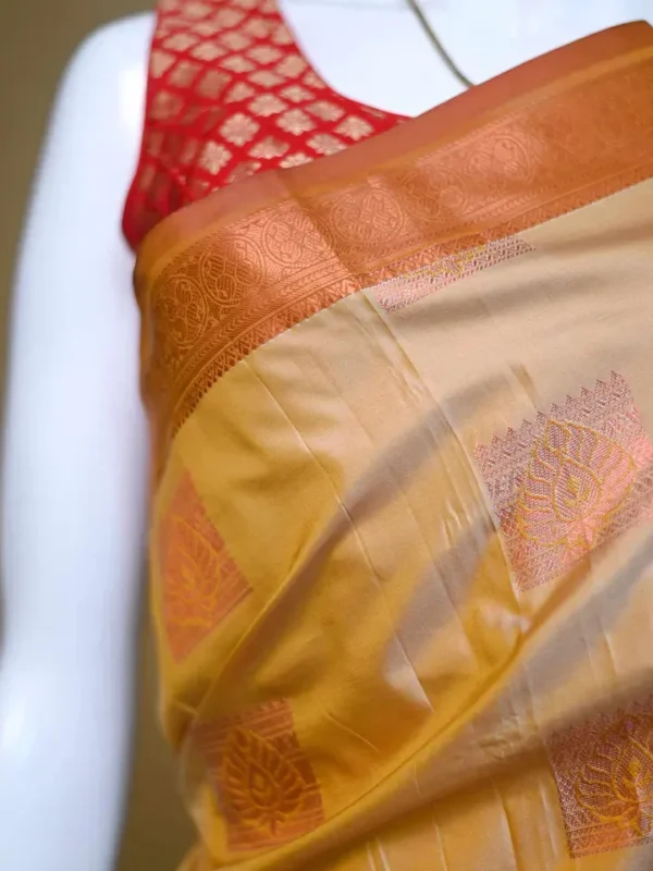Biscuit color with Brown border kanjivaram work on Pure silk saree
