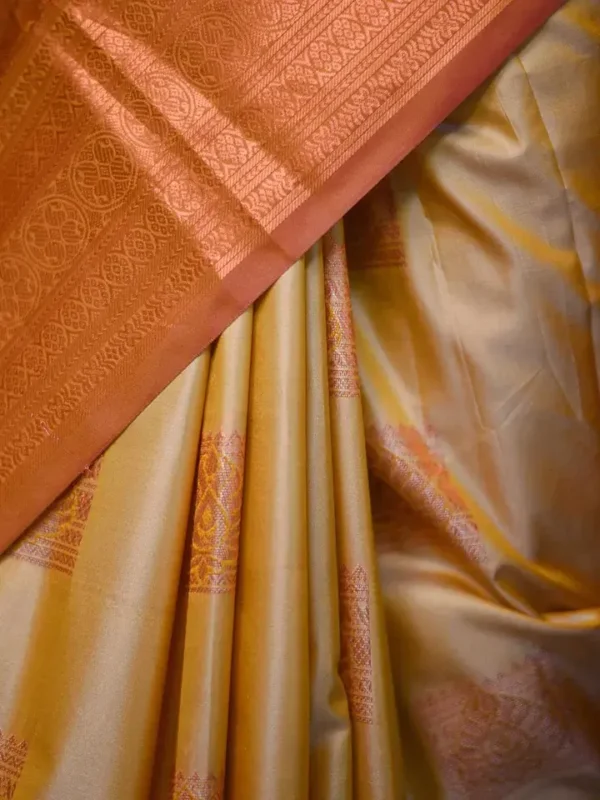 Biscuit color with Brown border kanjivaram work on Pure silk saree