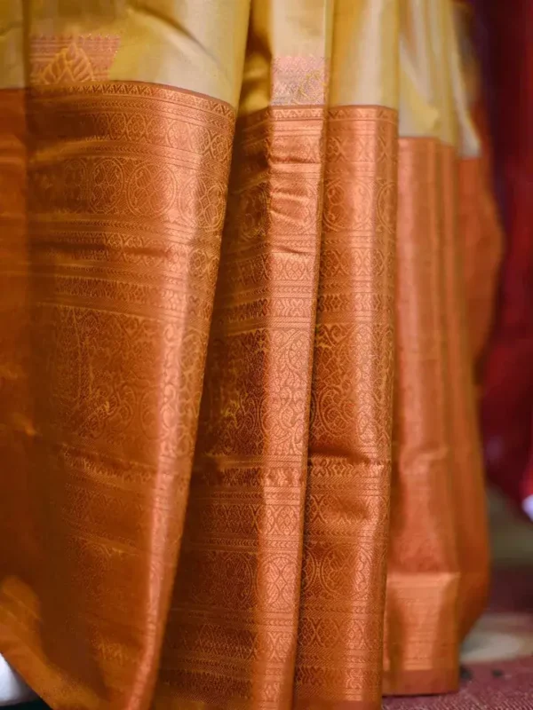 Biscuit color with Brown border kanjivaram work on Pure silk saree