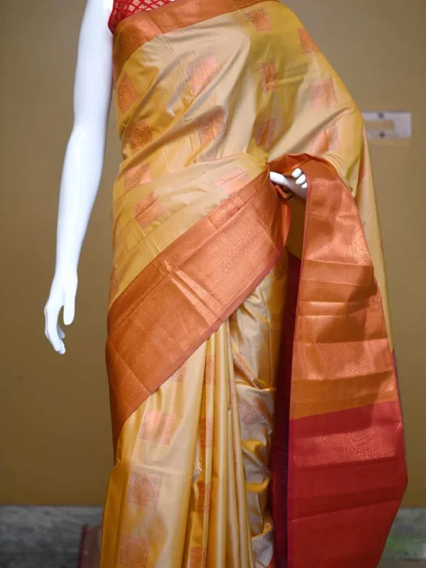Biscuit color with Brown border kanjivaram work on Pure silk saree