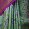 Light green color with purple border kanjivaram work on Pure silk saree