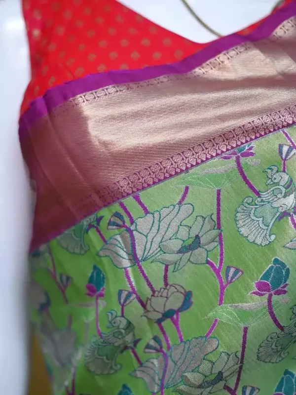 Light green color with purple border kanjivaram work on Pure silk saree