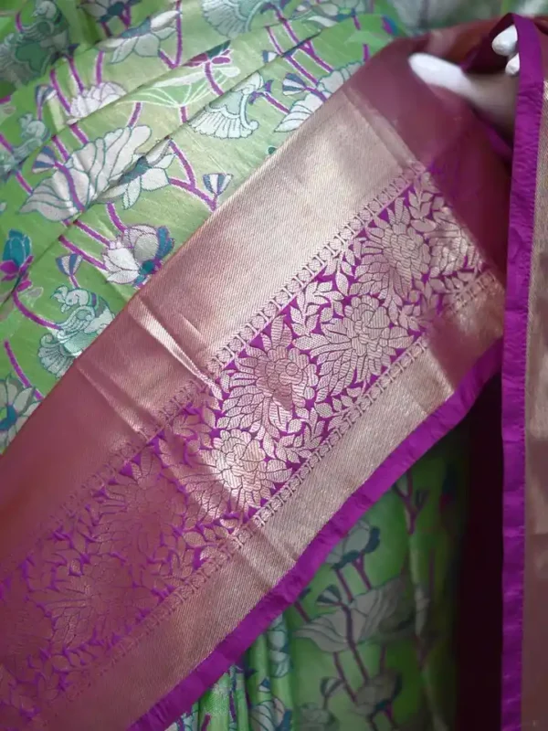 Light green color with purple border kanjivaram work on Pure silk saree