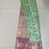Light green color with purple border kanjivaram work on Pure silk saree