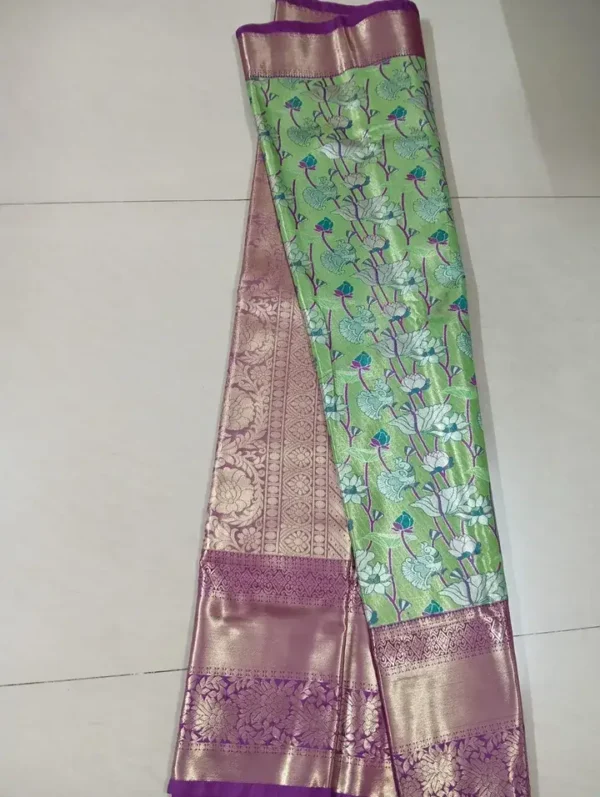 Light green color with purple border kanjivaram work on Pure silk saree