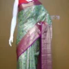 Light green color with purple border kanjivaram work on Pure silk saree