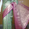 Light green color with purple border kanjivaram work on Pure silk saree