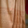 Biscuit color with maroon border kanjivaram work on Pure silk saree