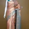 Peach color with sky blue border kanjivaram work on Pure silk saree