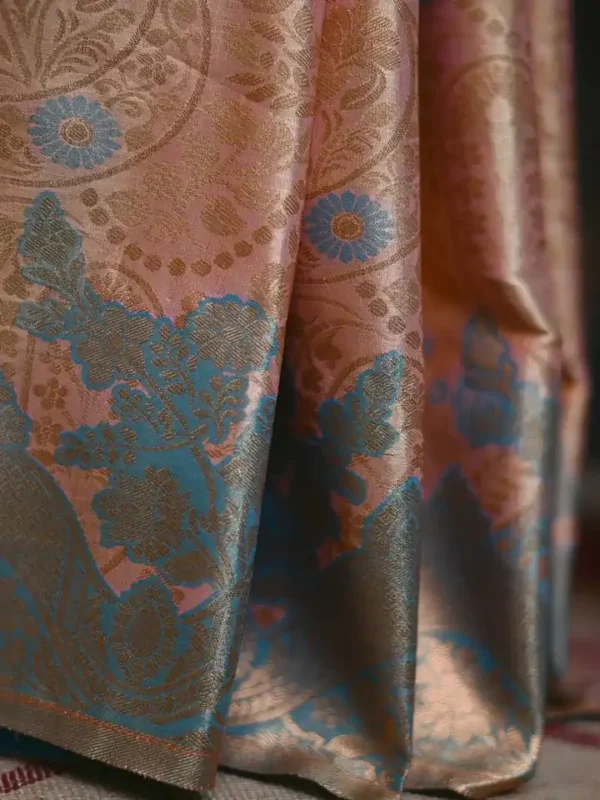Peach color with sky blue border kanjivaram work on Pure silk saree