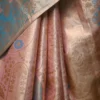 Peach color with sky blue border kanjivaram work on Pure silk saree