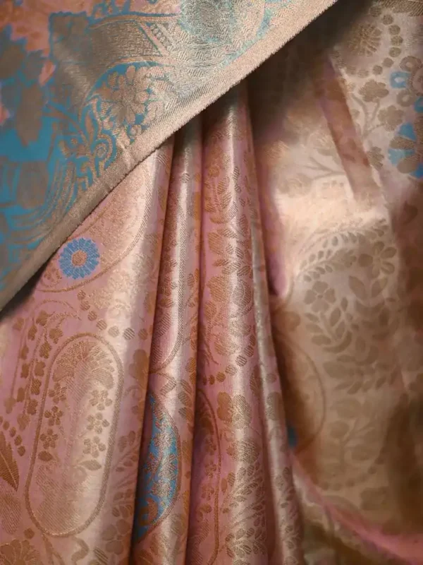 Peach color with sky blue border kanjivaram work on Pure silk saree