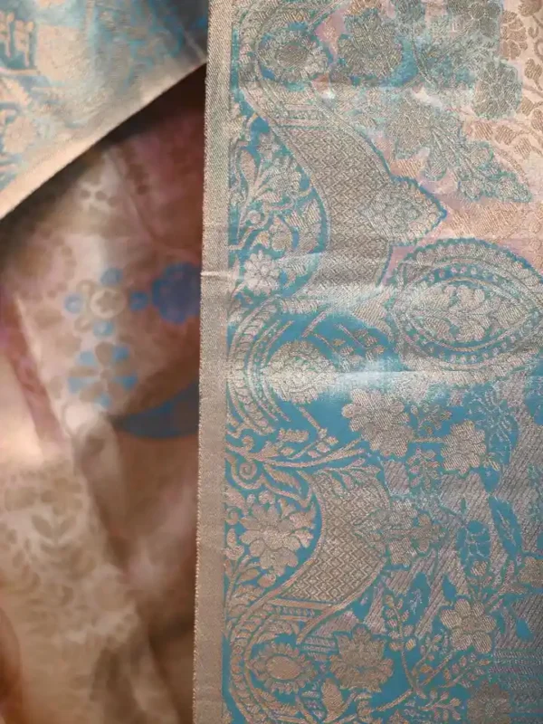 Peach color with sky blue border kanjivaram work on Pure silk saree