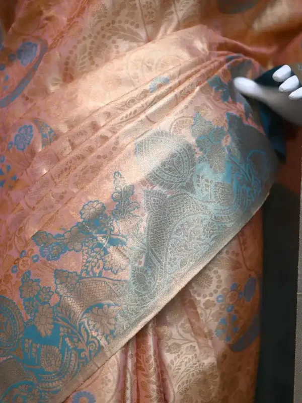 Peach color with sky blue border kanjivaram work on Pure silk saree