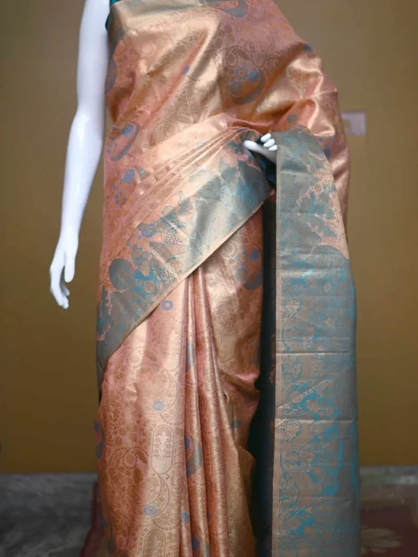 Peach color with sky blue border kanjivaram work on Pure silk saree