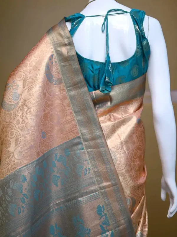 Peach color with sky blue border kanjivaram work on Pure silk saree