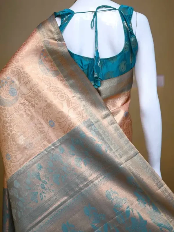 Peach color with sky blue border kanjivaram work on Pure silk saree