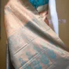 Peach color with sky blue border kanjivaram work on Pure silk saree