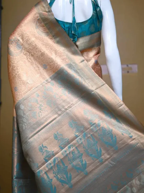 Peach color with sky blue border kanjivaram work on Pure silk saree