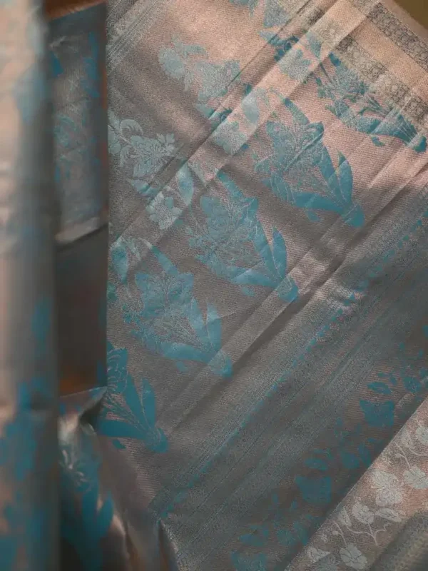 Peach color with sky blue border kanjivaram work on Pure silk saree
