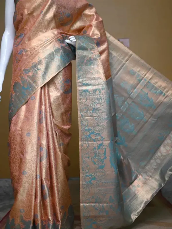 Peach color with sky blue border kanjivaram work on Pure silk saree