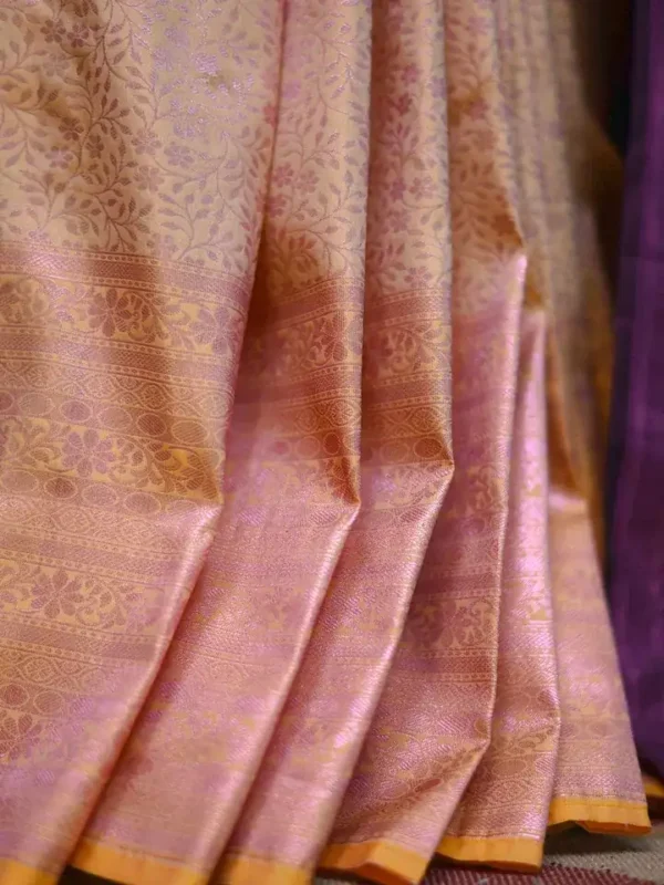 Peach with purple border kanjivaram work on Pure silk saree