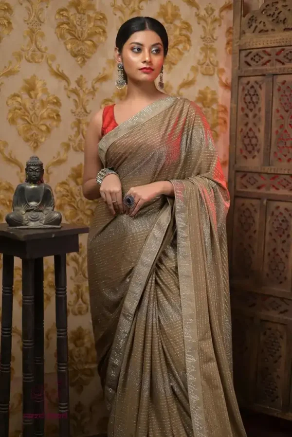 Sap Green Shimmer Stone work Border Pure crape silk Saree
