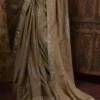 Sap Green Shimmer Stone work Border Pure crape silk Saree
