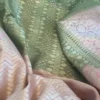 Sap Green Benarsasi on golden zari pink border muga silk saree