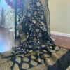 Black Benarasi on golden Ashraffi Butti zari work saree