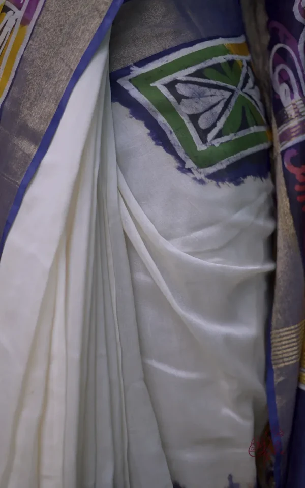 White n Blue on Multicolor Hand Batik Print with Zari Border Semi Silk Saree