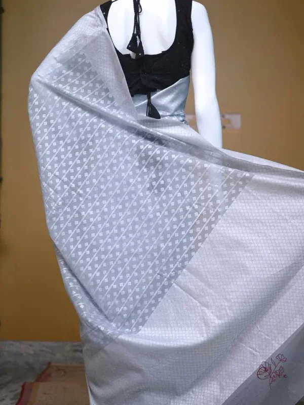 Grey on silver stripe and butta work Silk Saree