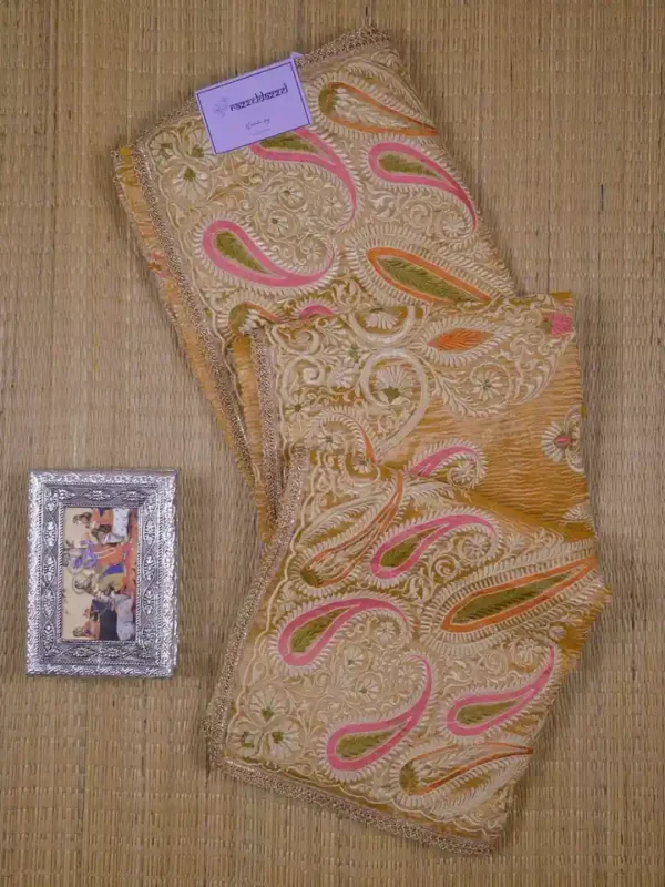 golden yellow embroidery border & pallu buti work on crep Tissue silk saree
