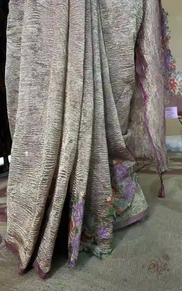 Wine on crush cutwork border with tussles on Tissue saree