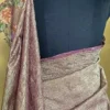 Wine on crush cutwork border with tussles on Tissue saree