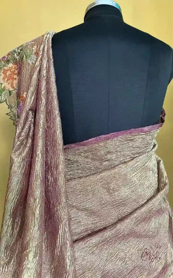 Wine on crush cutwork border with tussles on Tissue saree