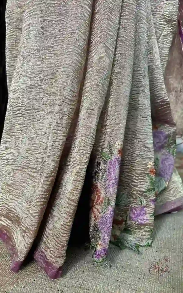 Wine on crush cutwork border with tussles on Tissue saree