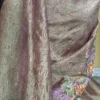 Wine on crush cutwork border with tussles on Tissue saree
